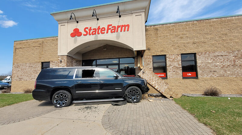 Woman arrested after crashing vehicle into insurance office
